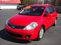 2010 Red Alert Nissan Versa 1.8 S Hatchback  photo #1