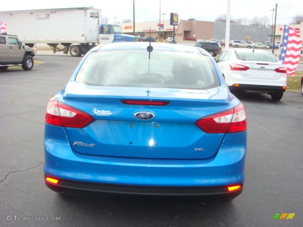 2012 Focus SEL Sedan - Blue Candy Metallic / Charcoal Black photo #4