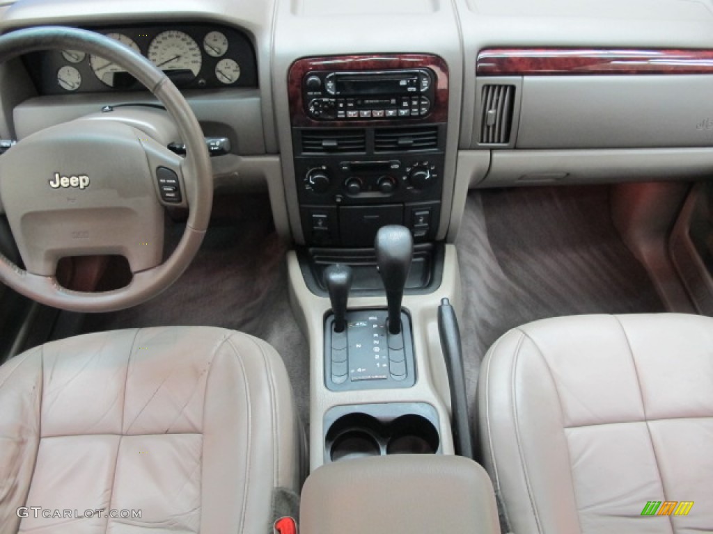 2002 Grand Cherokee Limited 4x4 - Inferno Red Tinted Pearlcoat / Sandstone photo #26