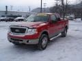 2006 Bright Red Ford F150 Lariat SuperCab 4x4  photo #2