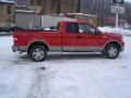 2006 Bright Red Ford F150 Lariat SuperCab 4x4  photo #17