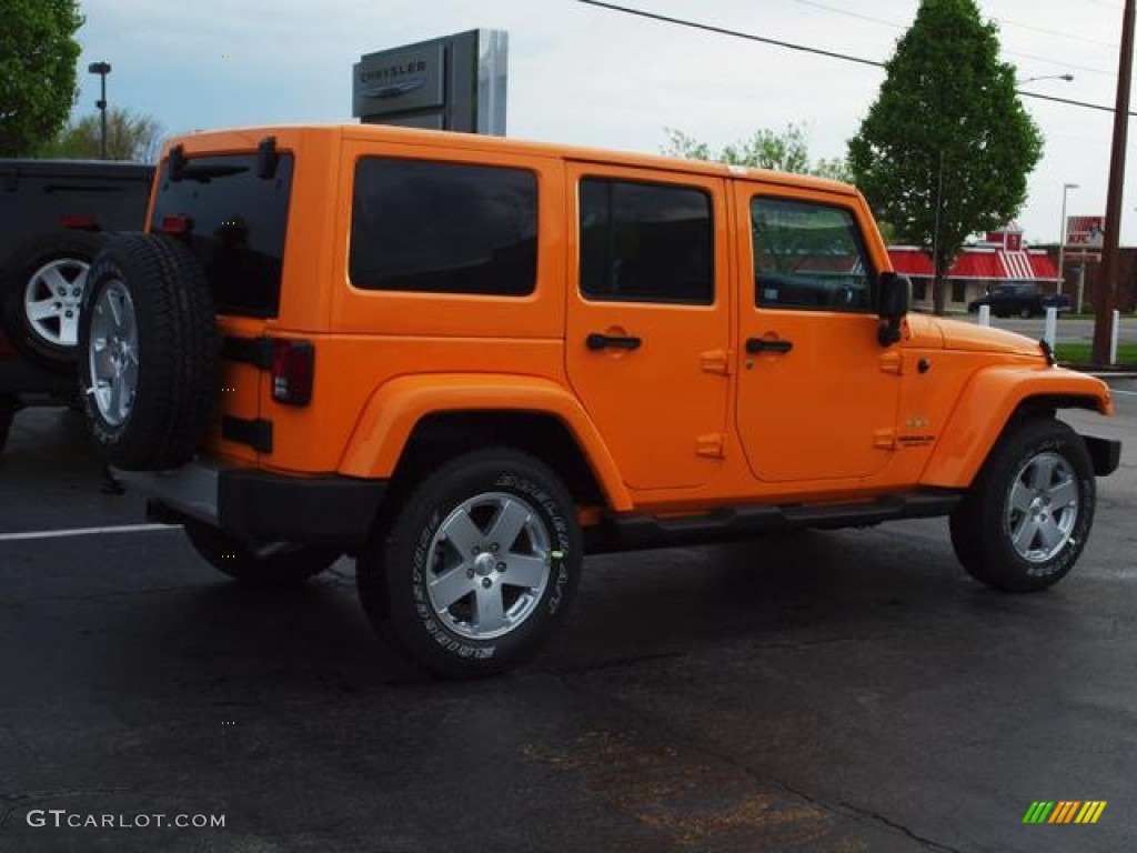 2012 Wrangler Unlimited Sahara 4x4 - Dozer Yellow / Black photo #3