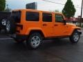 2012 Dozer Yellow Jeep Wrangler Unlimited Sahara 4x4  photo #3