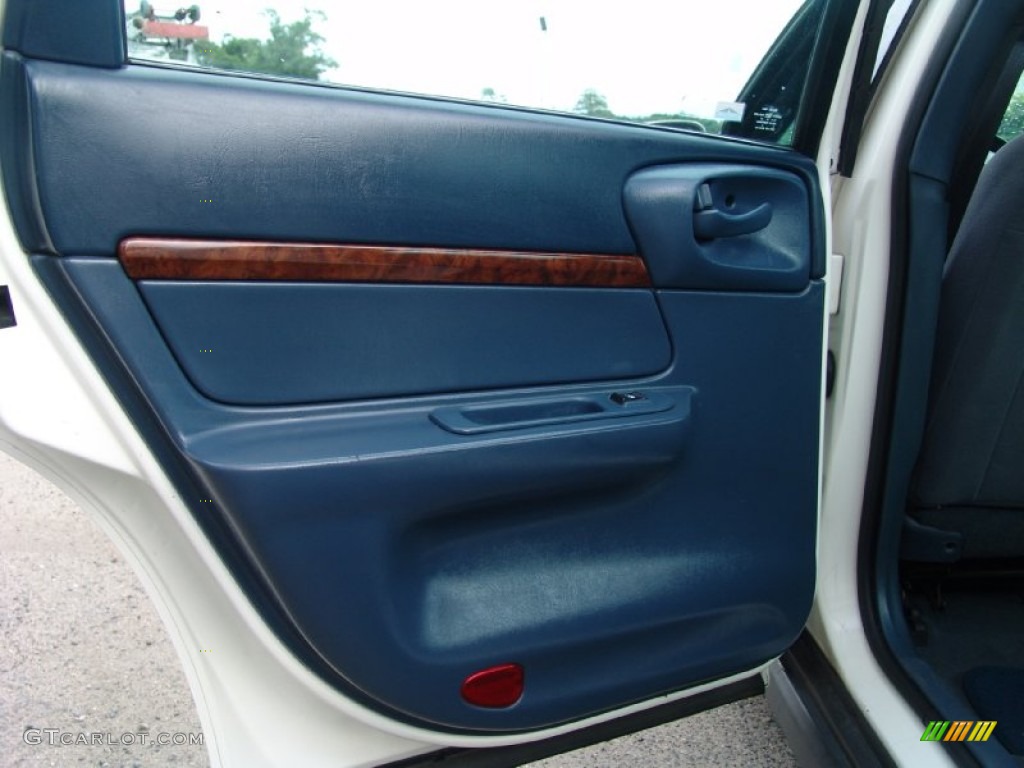 2004 Chevrolet Impala Standard Impala Model Regal Blue Door Panel Photo #63160155