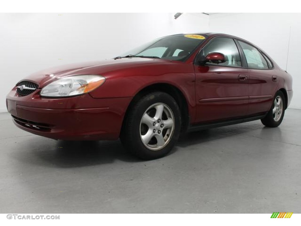 2002 Taurus SES - Matador Red Metallic / Medium Graphite photo #1