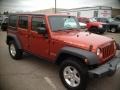 2009 Sunburst Orange Pearl Jeep Wrangler Unlimited Rubicon 4x4  photo #4