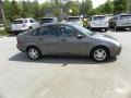 2002 Liquid Grey Metallic Ford Focus SE Sedan  photo #8