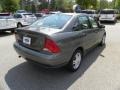 2002 Liquid Grey Metallic Ford Focus SE Sedan  photo #13