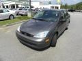 2002 Liquid Grey Metallic Ford Focus SE Sedan  photo #19