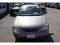 2005 Arizona Beige Metallic Ford Focus ZX4 SES Sedan  photo #2