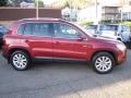 2009 Wild Cherry Metallic Volkswagen Tiguan SE 4Motion  photo #13