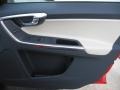 2012 Volvo XC60 R Design Soft Beige/Black Inlay Interior Door Panel Photo