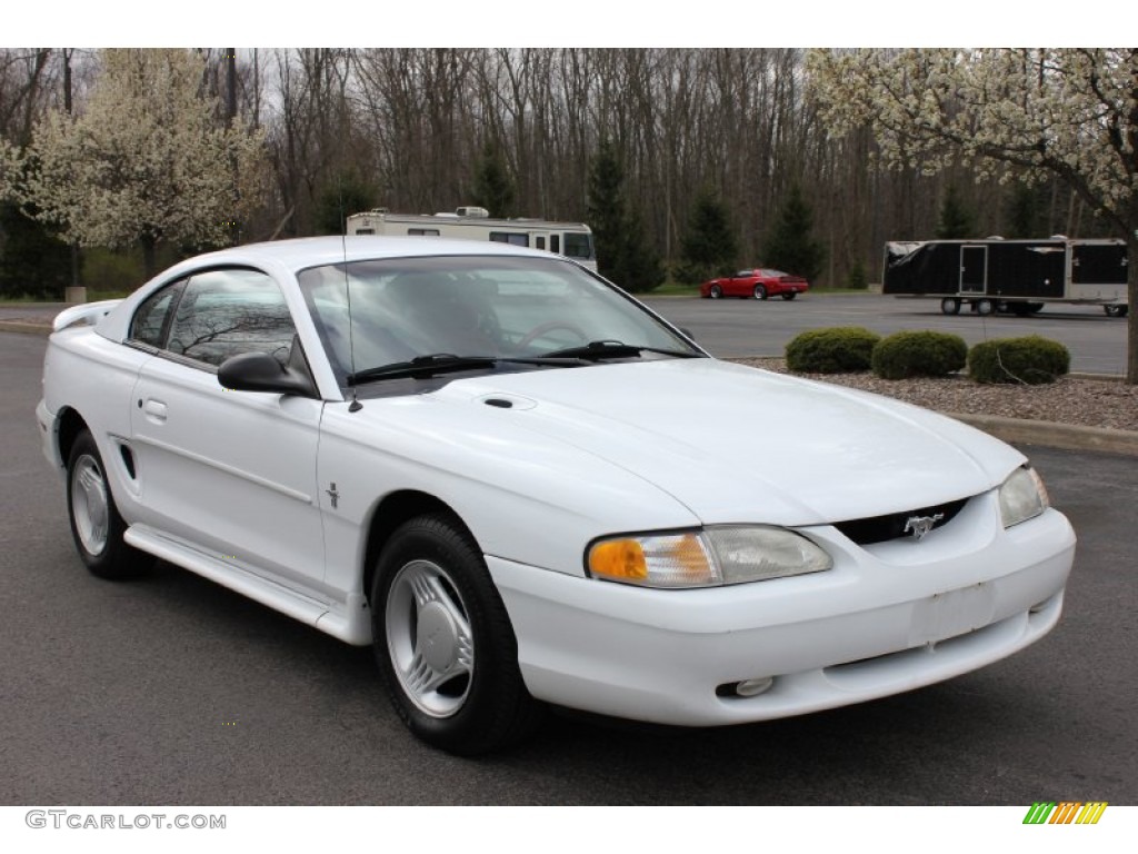 Crystal White 1995 Ford Mustang V6 Coupe Exterior Photo #63397640