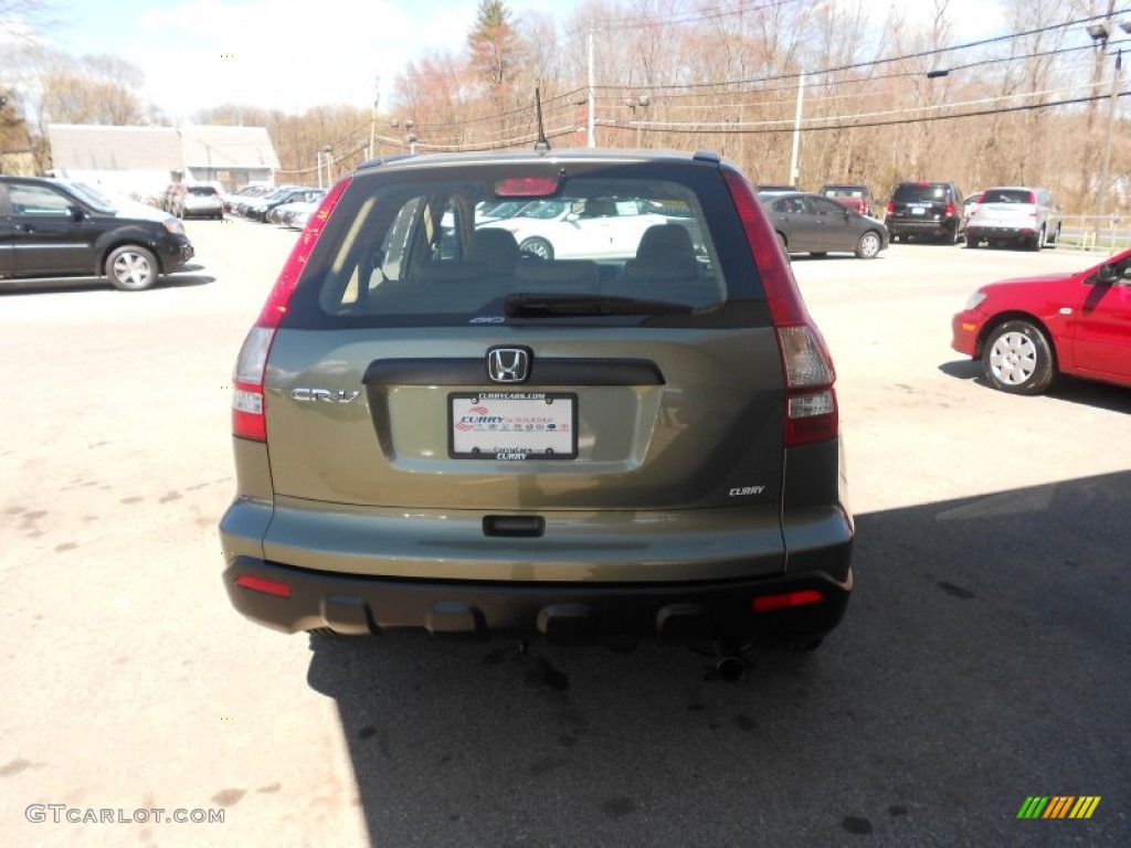 2009 CR-V LX 4WD - Green Tea Metallic / Ivory photo #27