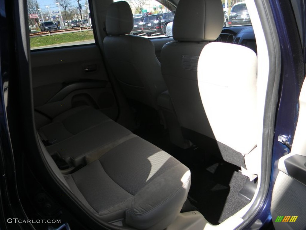 2010 Outlander SE 4WD - Cosmic Blue Metallic / Beige photo #15