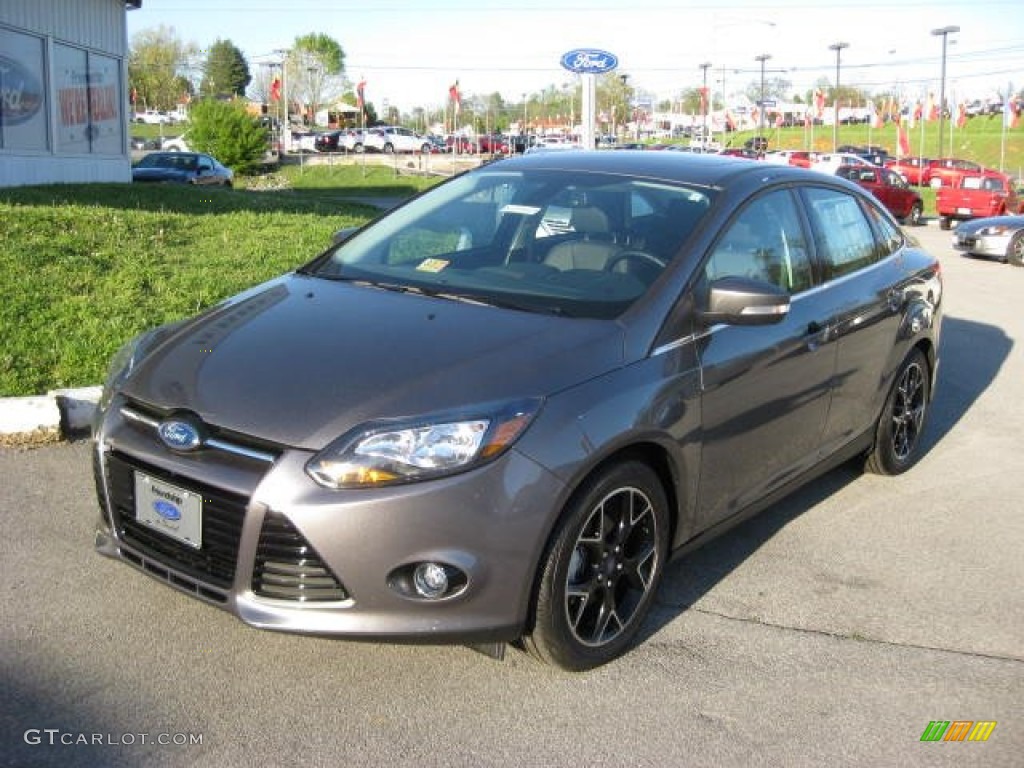 2012 Focus Titanium Sedan - Sterling Grey Metallic / Charcoal Black Leather photo #2