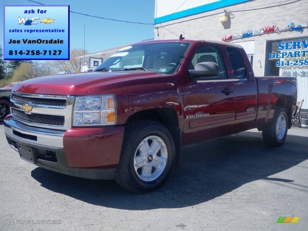 2009 Silverado 1500 LT Extended Cab 4x4 - Deep Ruby Red Metallic / Light Cashmere photo #1