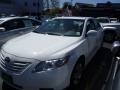 Super White - Camry LE Photo No. 1