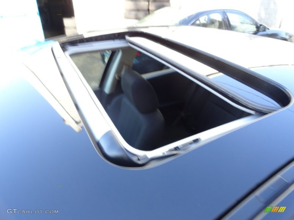 2010 MAZDA3 i Touring 4 Door - Black Mica / Black photo #28