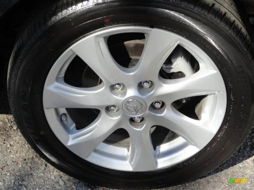 2010 MAZDA3 i Touring 4 Door - Black Mica / Black photo #30