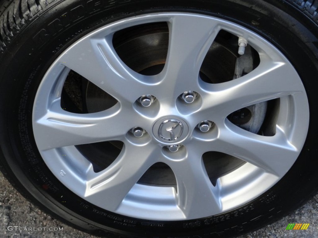 2010 MAZDA3 i Touring 4 Door - Black Mica / Black photo #31