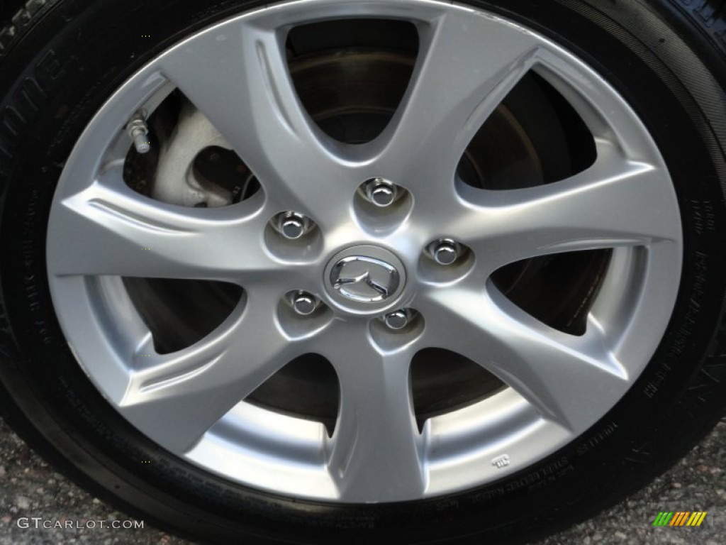 2010 MAZDA3 i Touring 4 Door - Black Mica / Black photo #32