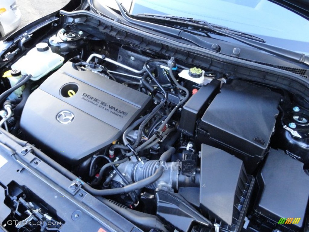 2010 MAZDA3 i Touring 4 Door - Black Mica / Black photo #33