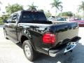 2002 Black Ford F150 Lariat SuperCrew 4x4  photo #9