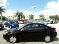 2011 Ebony Black Ford Focus S Sedan  photo #12