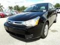 2011 Ebony Black Ford Focus S Sedan  photo #14