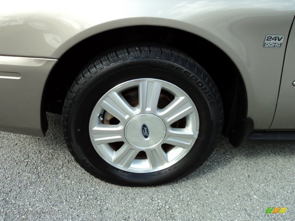 2004 Ford Taurus SEL Sedan Wheel Photo #63615523