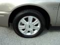 2004 Ford Taurus SEL Sedan Wheel and Tire Photo