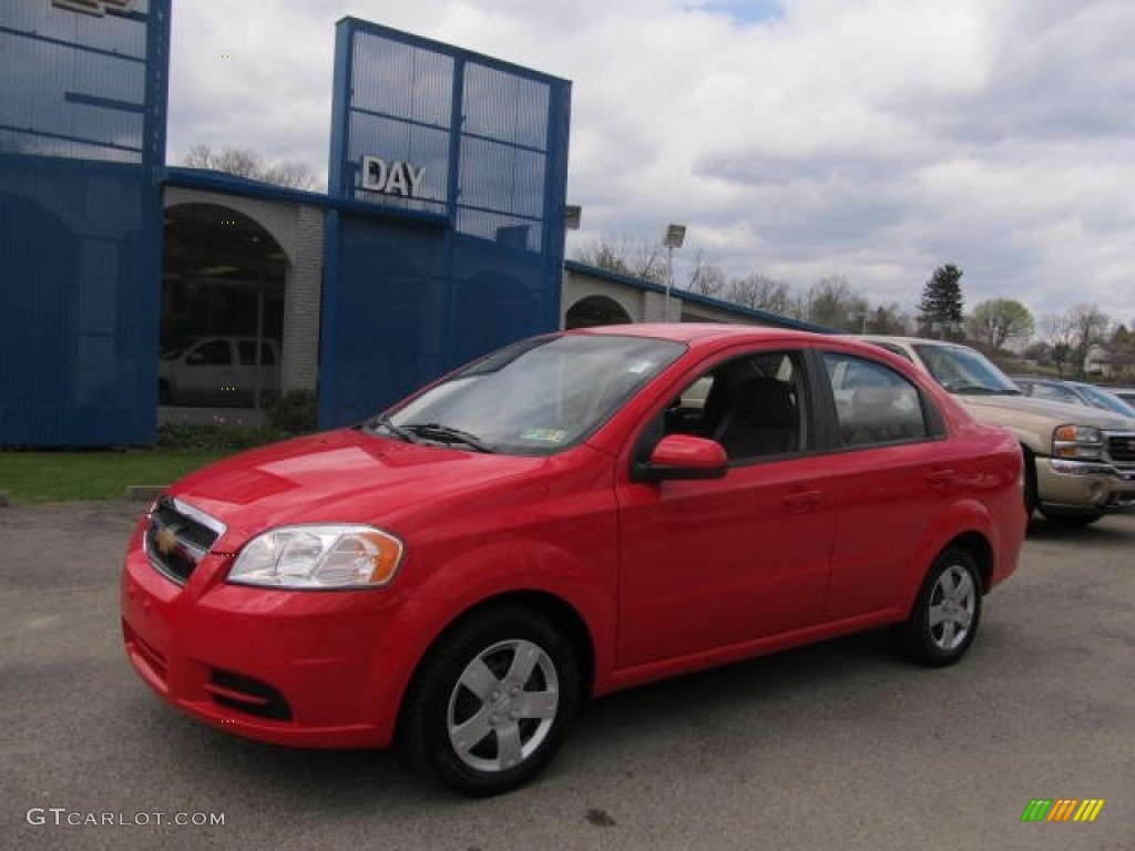 2010 Aveo LT Sedan - Victory Red / Charcoal photo #1