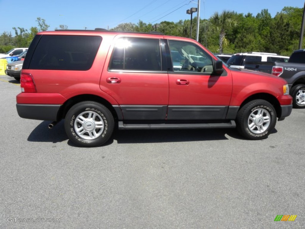 Laser Red Tinted Metallic 2003 Ford Expedition XLT Exterior Photo #63637396