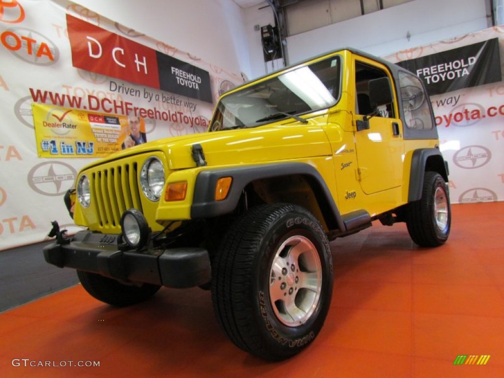 2002 Wrangler Sport 4x4 - Solar Yellow / Agate Black photo #1