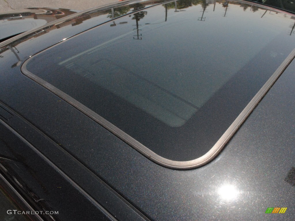2009 3 Series 328xi Coupe - Black Sapphire Metallic / Black photo #11