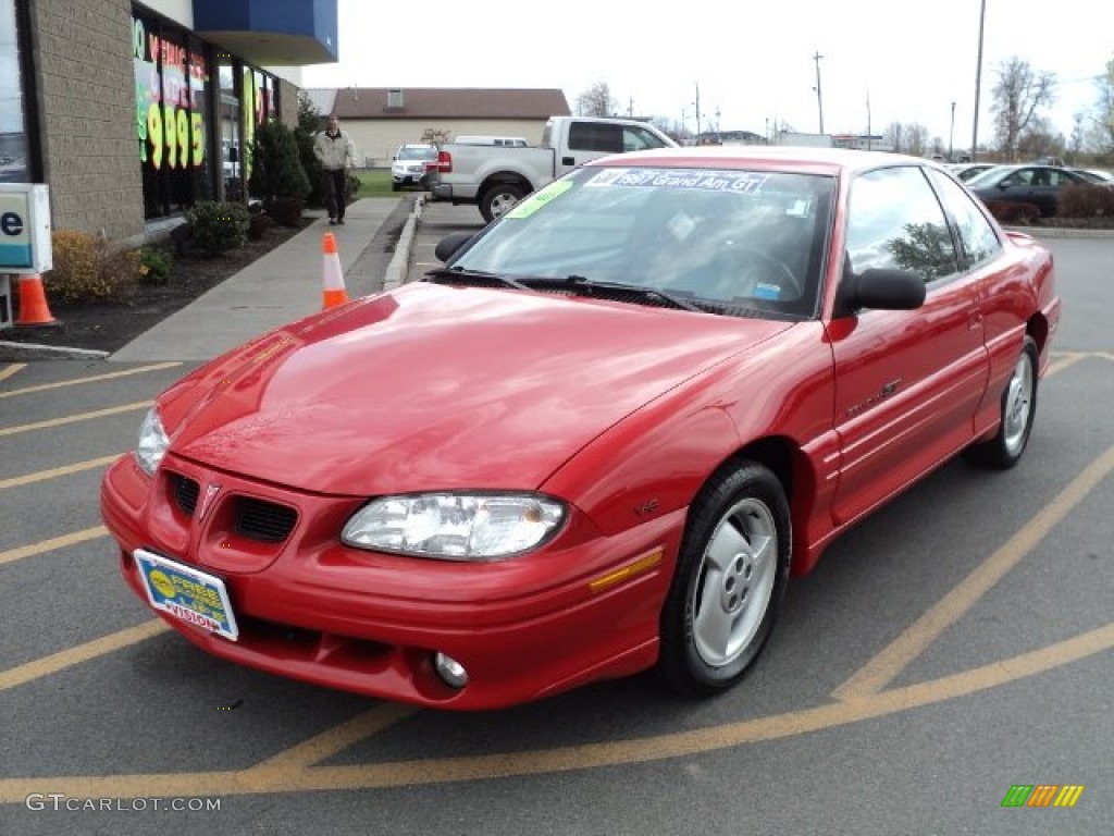 Bright Red Pontiac Grand Am