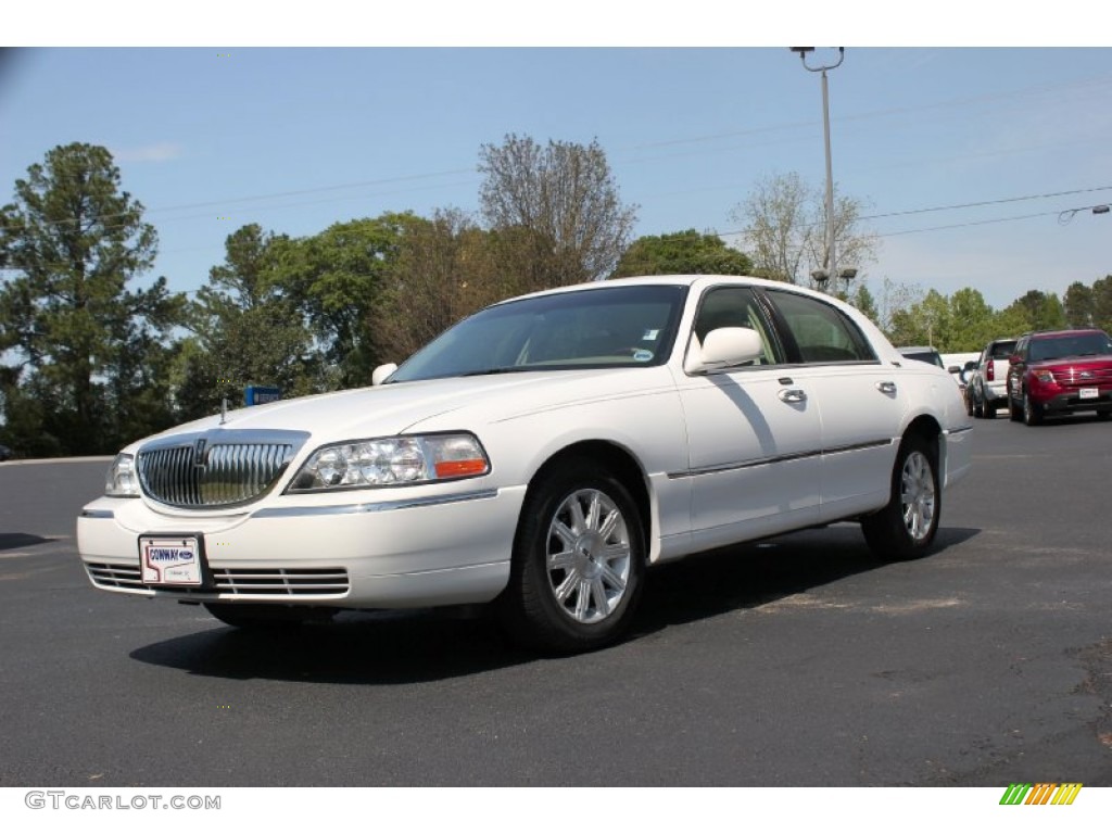 Vibrant White Lincoln Town Car