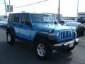 2010 Surf Blue Pearl Jeep Wrangler Unlimited Islander Edition 4x4  photo #3