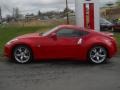 2011 Solid Red Nissan 370Z Coupe  photo #13