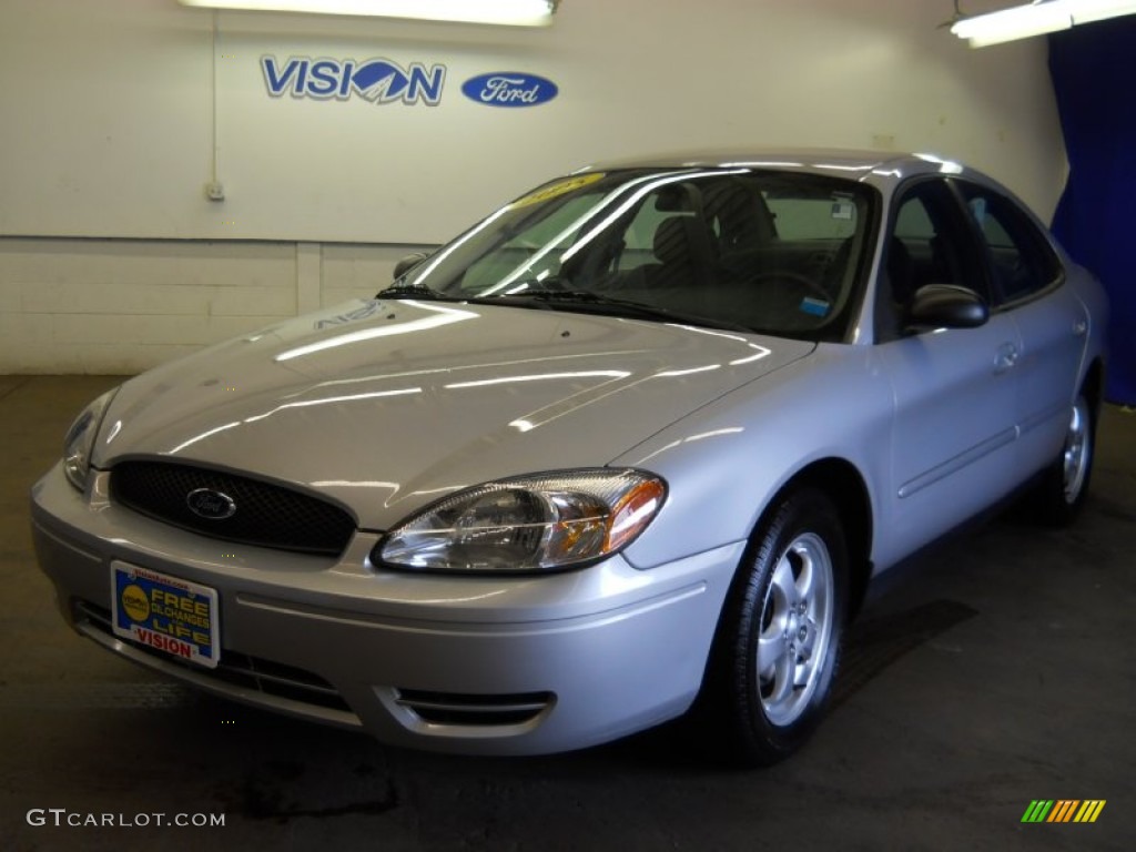 Silver Frost Metallic Ford Taurus