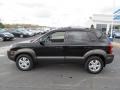 Obsidian Black Metallic - Tucson SE 4WD Photo No. 6