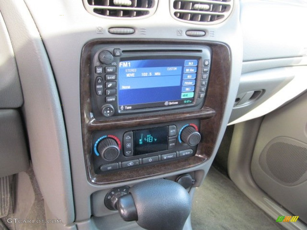 2004 Rainier CXL AWD - Black / Medium Pewter photo #19