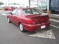 2003 Pepper Red Kia Spectra Sedan  photo #3