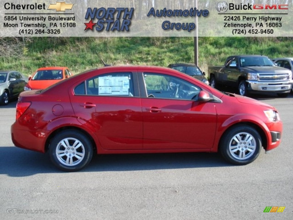 2012 Sonic LS Sedan - Crystal Red Tintcoat / Jet Black/Dark Titanium photo #1