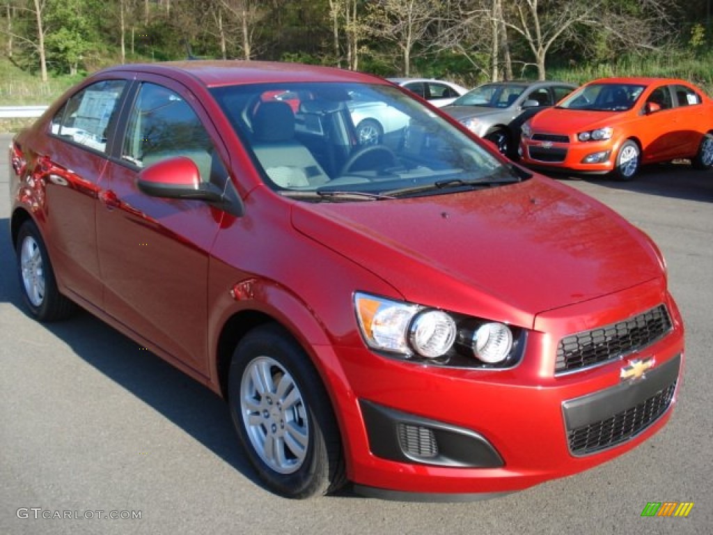 2012 Sonic LS Sedan - Crystal Red Tintcoat / Jet Black/Dark Titanium photo #2