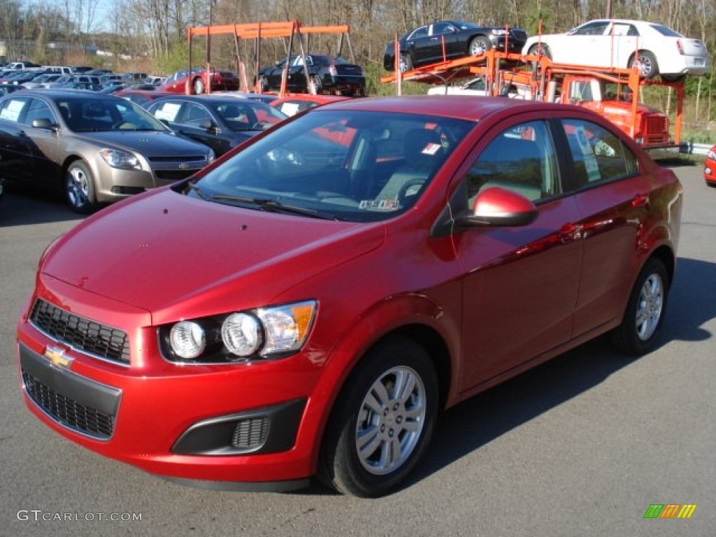 2012 Sonic LS Sedan - Crystal Red Tintcoat / Jet Black/Dark Titanium photo #4