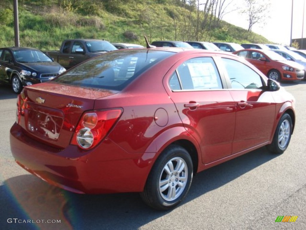 2012 Sonic LS Sedan - Crystal Red Tintcoat / Jet Black/Dark Titanium photo #8