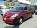 2010 Salsa Red Pearl Toyota Sienna LE  photo #3