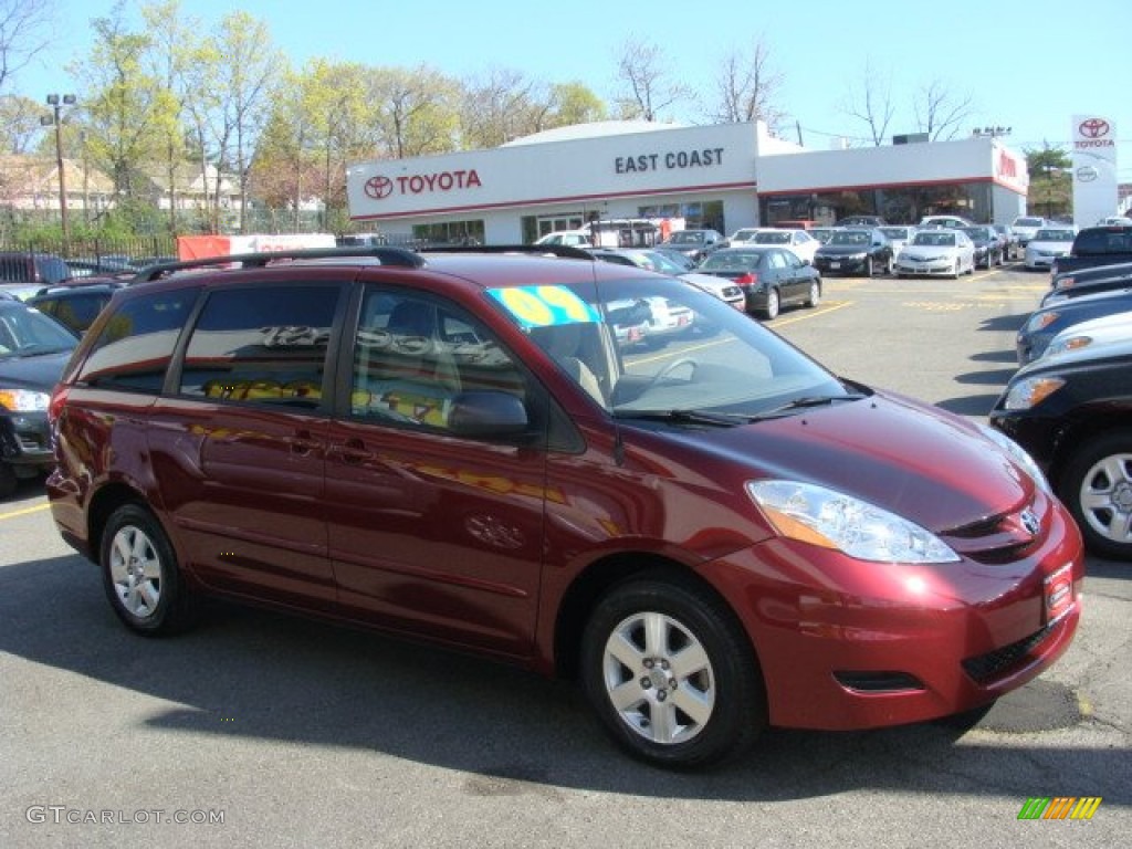 2009 Sienna LE - Salsa Red Pearl / Taupe photo #1